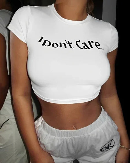 I Don’t Care Baby Tee for Women – White Cropped Graphic Top