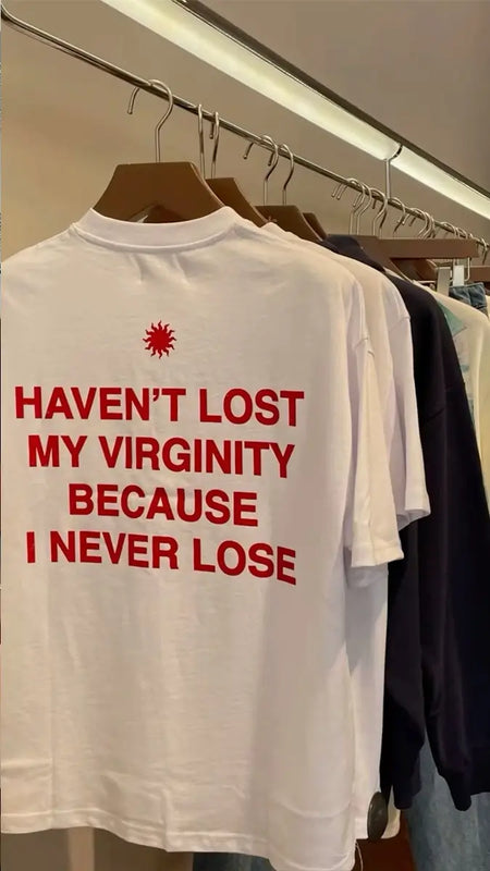 Funny Men’s White Graphic T-Shirt – “Haven’t Lost My Virginity Because I Never Lose” Statement Tee