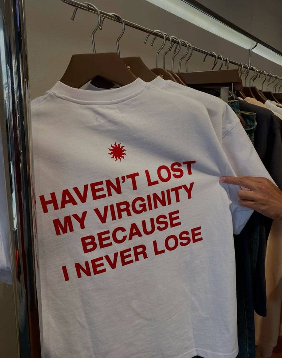 Funny Men’s White Graphic T-Shirt – “Haven’t Lost My Virginity Because I Never Lose” Statement Tee